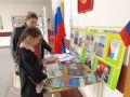 Ко Дню школьных библиотек в МКОУ СОШ с.п.Псыкод заведующая библиотекой и член УИК №288 Тхагалегова М.А. и председатель УИК №288 Гажева Л.А. организовали выставку, посвященную 30-летию Избиркома КБР